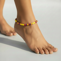 Handcrafted Multicolour Pipe & Bead Anklet – Yellow, Purple & Red
