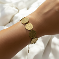Golden Coin-Patterned Beaten Bracelet