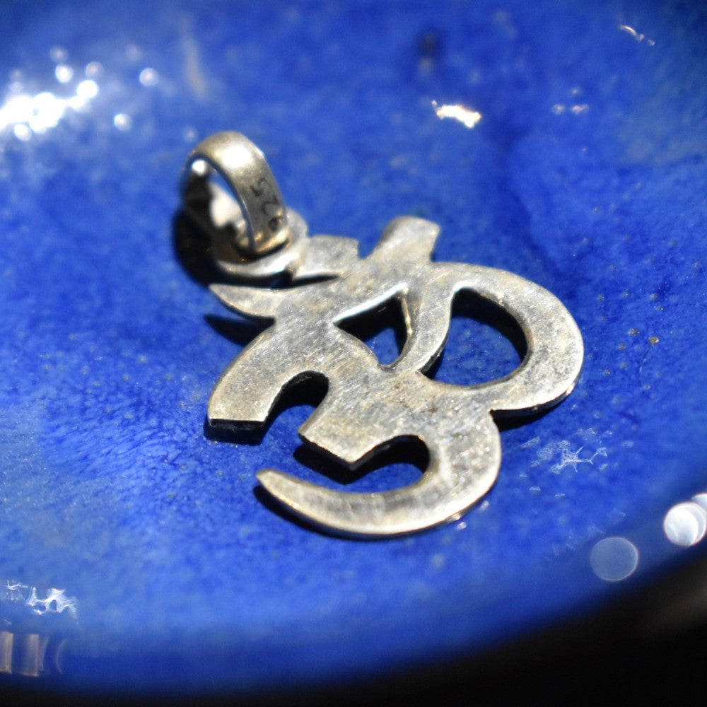 Silver spiritual om pendant MYRA India