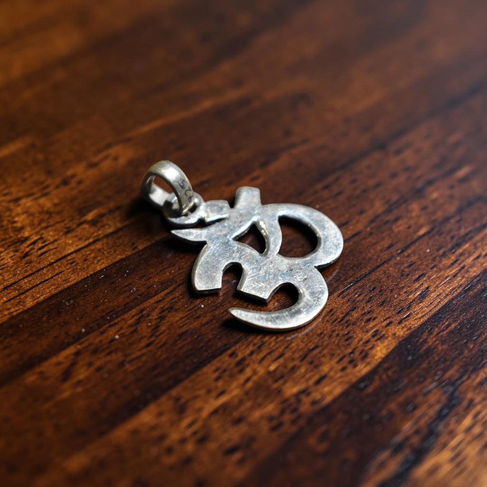 Handcrafted silver om symbol pendant online India MYRA