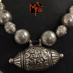 Drum Shaped Pendant with Lightweight Beads