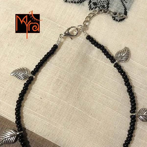 Black Anklet with Rounded Silver Flower Charms