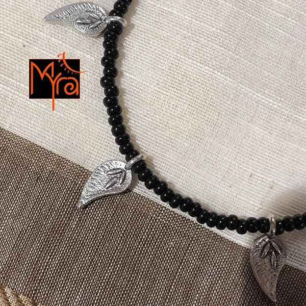 Black Anklet with Long Silver Flower Charms