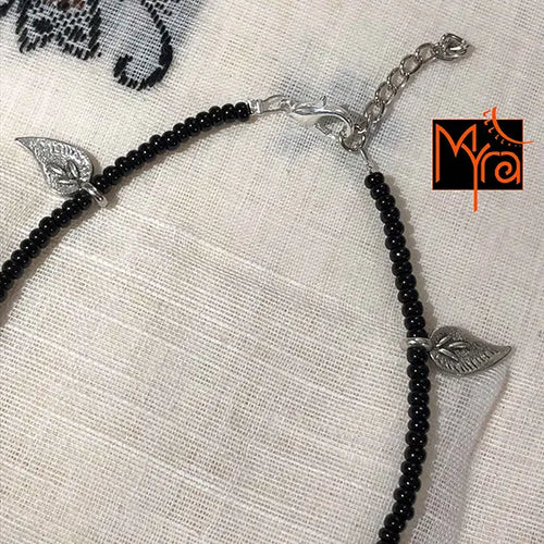 Black Anklet with Long Silver Flower Charms