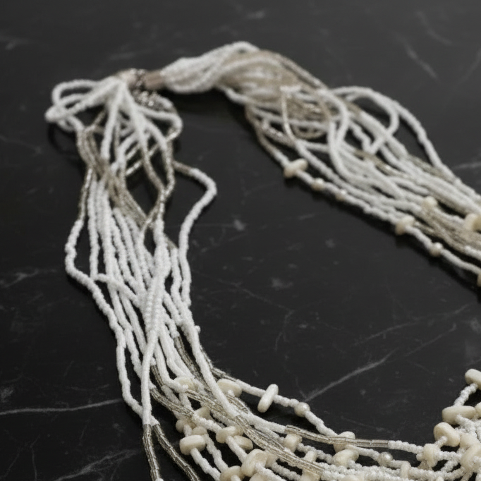 Pure Elegance: White Bead Layered Necklace