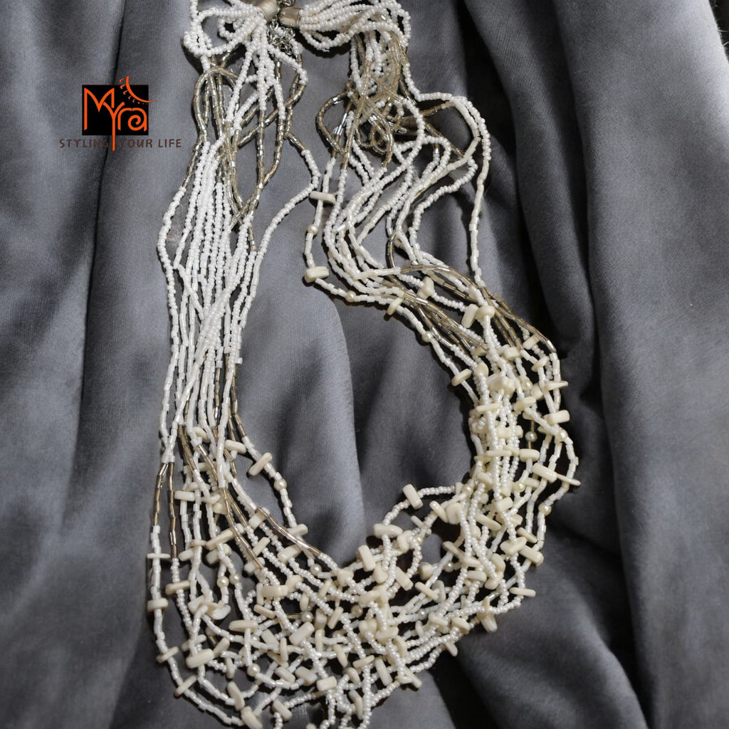 Pure Elegance: White Bead Layered Necklace