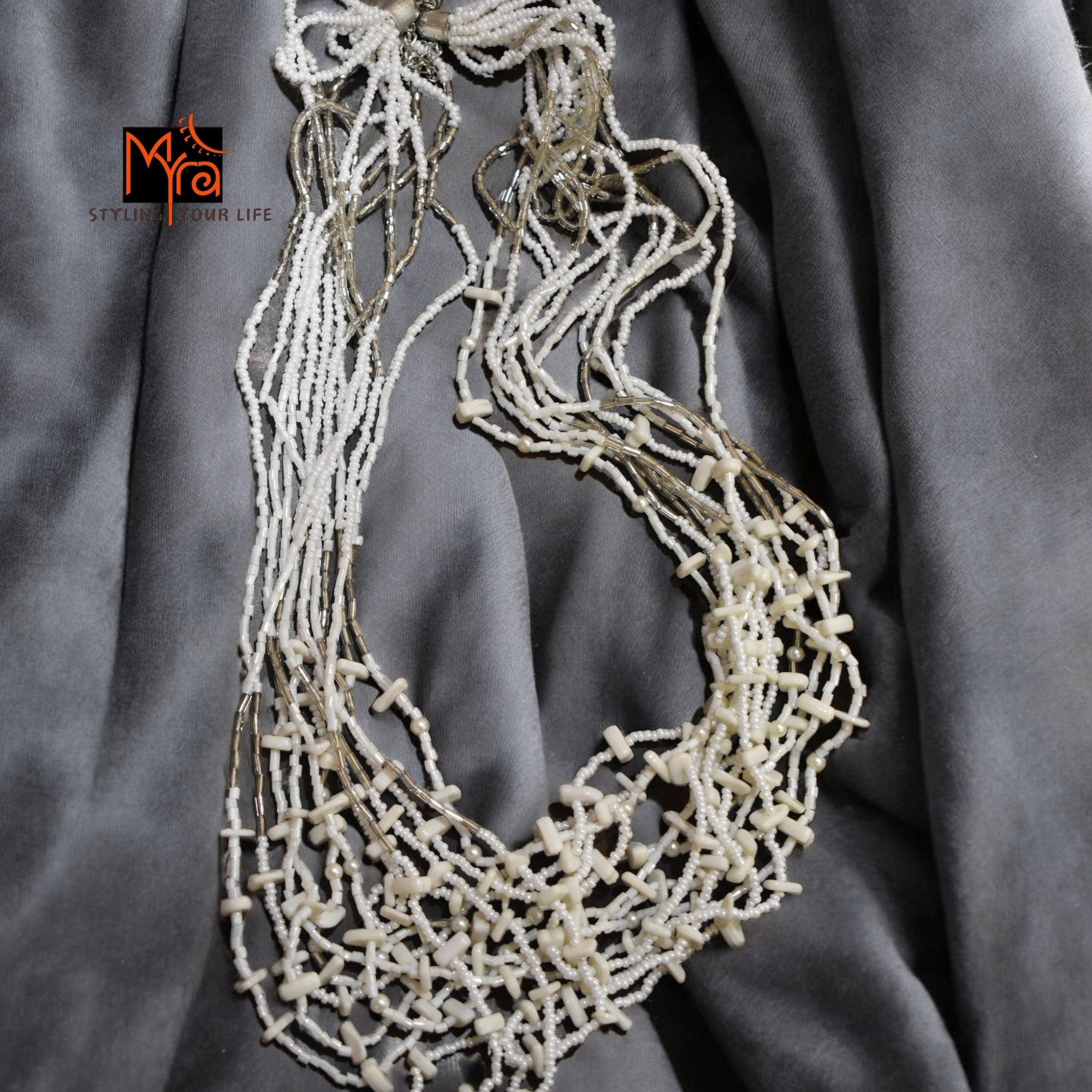 Pure Elegance: White Bead Layered Necklace