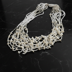 Pure Elegance: White Bead Layered Necklace