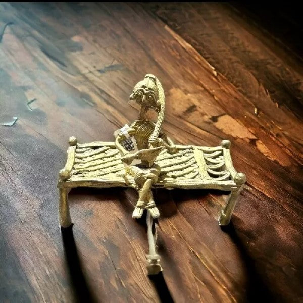 Dokra Lady on Bed