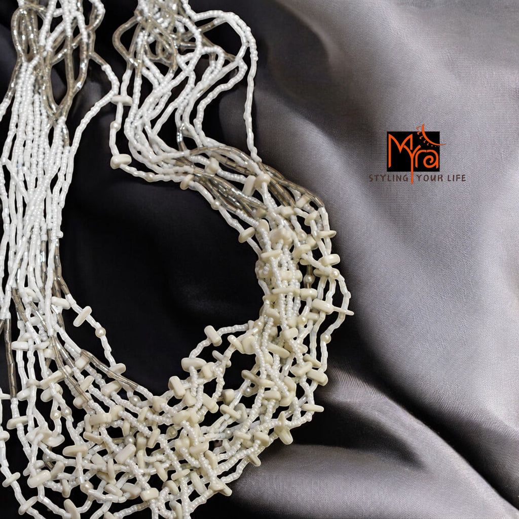 Pure Elegance: White Bead Layered Necklace