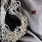 Pure Elegance: White Bead Layered Necklace