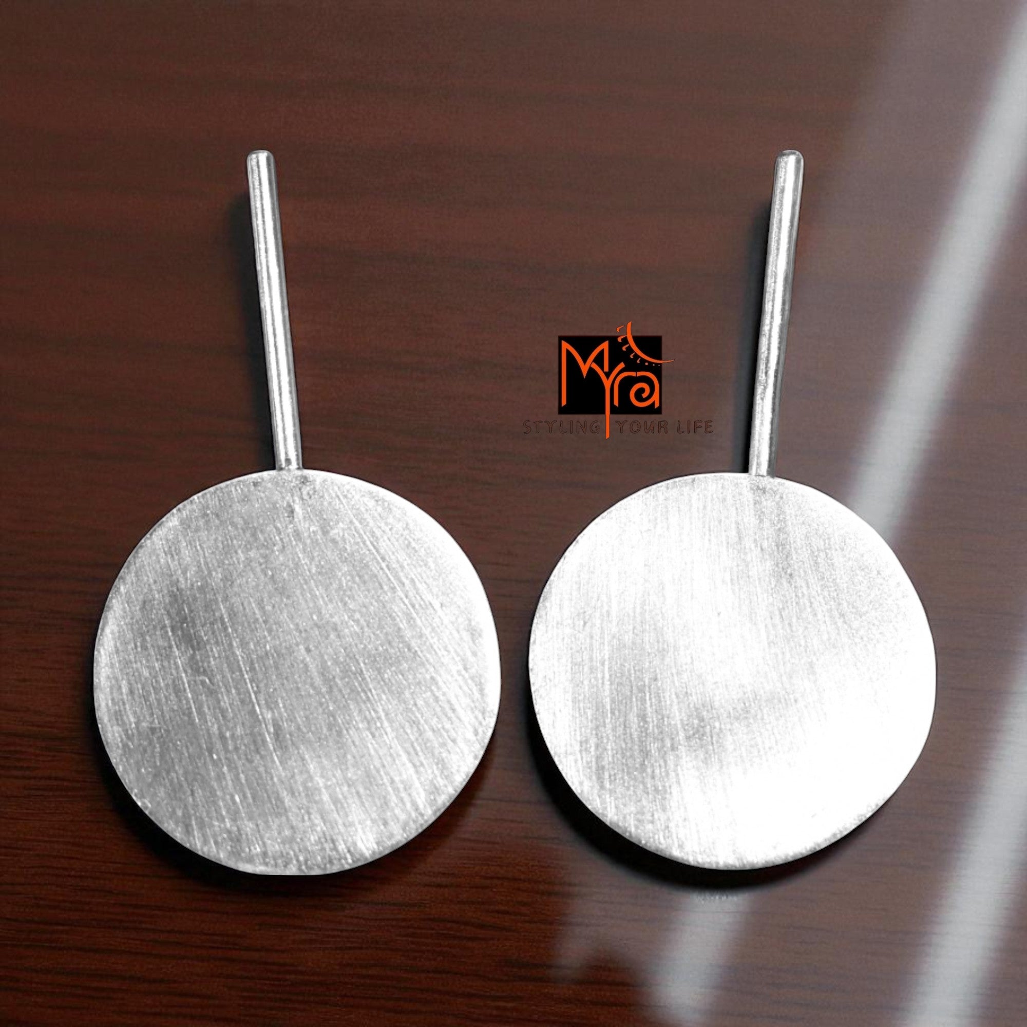 The Circle Brass Ear Studs (Silver Polished)
