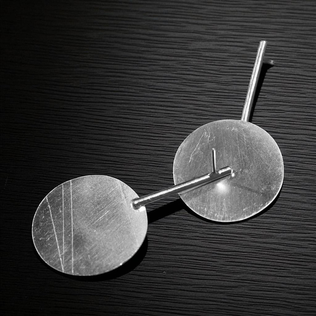 The Circle Brass Ear Studs (Silver Polished)