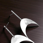 The Inverted Crescent Brass Ear Studs (Silver Polished)